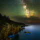 Illustration for article titled Behold the Ghostly Glow of a Bioluminescent Coastline Under the Milky Way